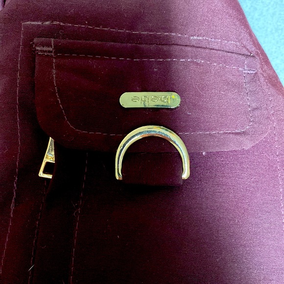 Brand: Bebe Colour: burgundy, black, with gold accents. Size: Large. - Picture 2 of 5
